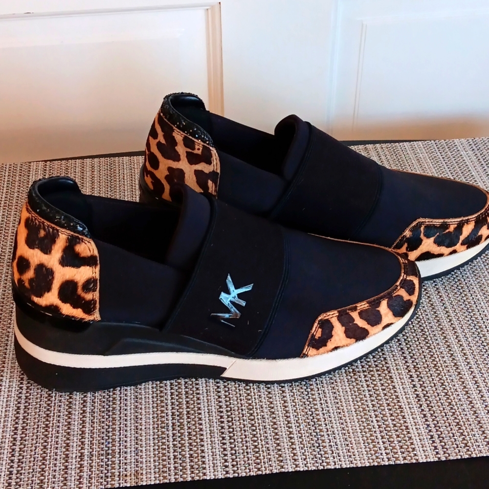 Michael Kors Felix wedge heel slip on sneakers in leopard print and black
